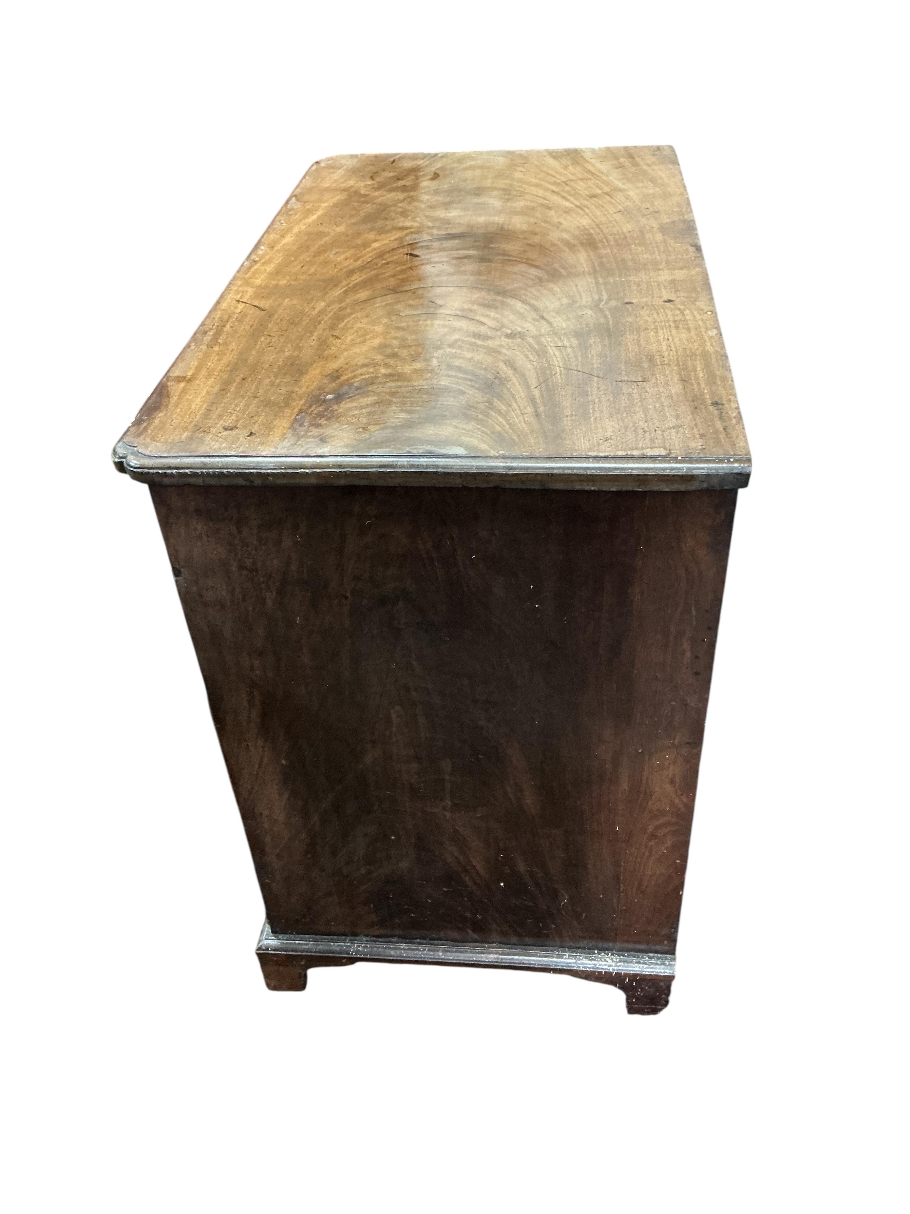 A George II mahogany kneehole desk, width 120cm, depth 48cm, height 75cm